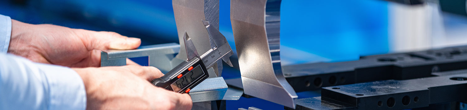 Long Image of Man Working on Metal Fabrication | Elite Welding & Fabrication