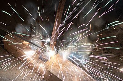 stick-welding Stick Welding Image With Sparks Flying | Elite Welding & Fabrication