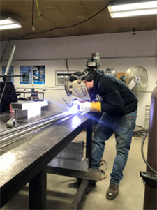 Man Doing Metal Fabrication and Welding | Elite Welding & Fabrication