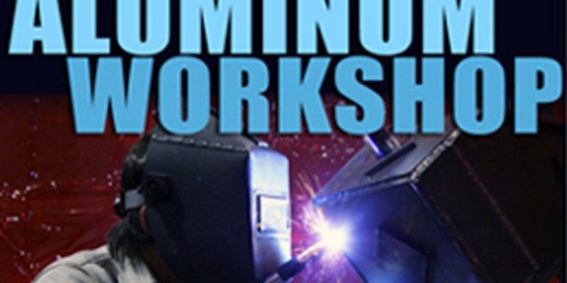 Aluminum workshop graphic of a welder working on a project.