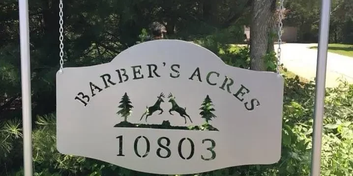 Elite Welding Barber’s Acres Sign A custom designed metal road sign for Barber's Acres.