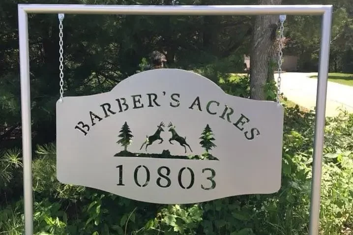 Elite Welding Barber’s Acres Sign A custom designed metal road sign for Barber's Acres.